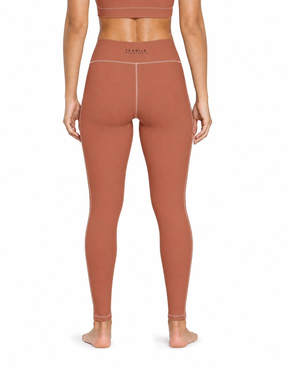 TENSILE High-Rise Legging in clay, rear view showing back waistband mark