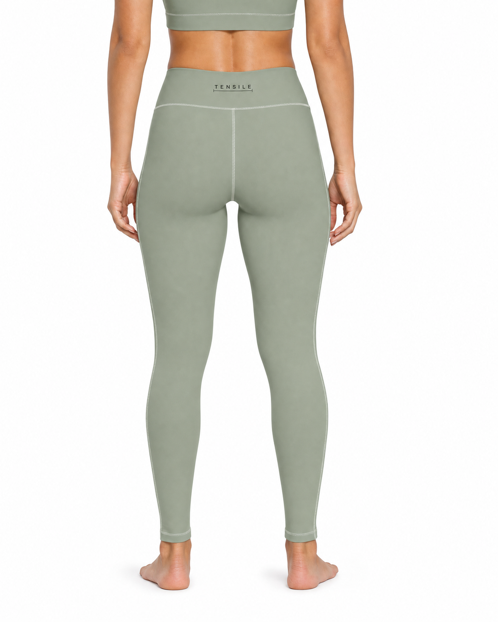 TENSILE High-Rise Legging in sage, rear view showing back waistband mark