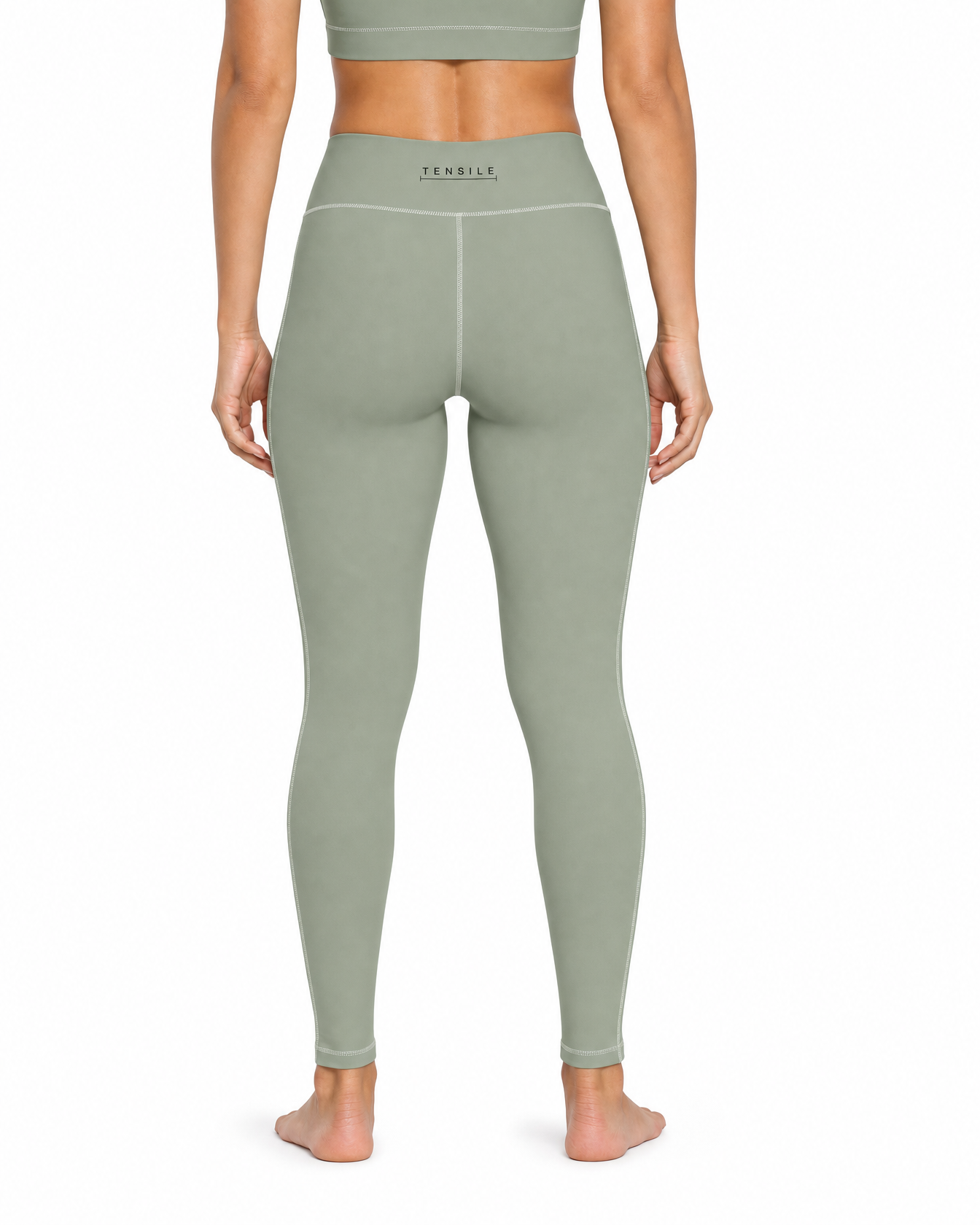 TENSILE High-Rise Legging in sage, rear view showing back waistband mark